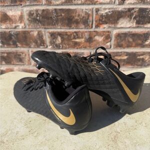 Nike Black and Gold Athletic Cleats in size 4Y